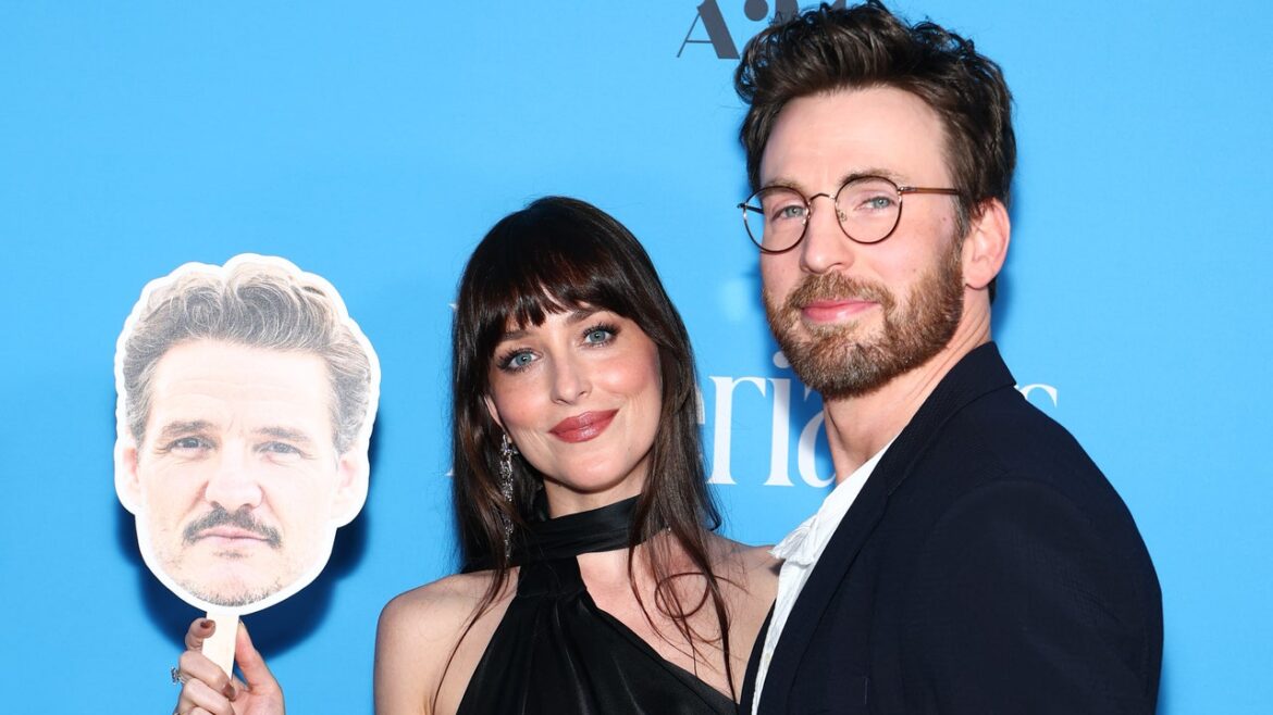 Dakota Johnson Accessorizes With Pedro Pascal’s Head