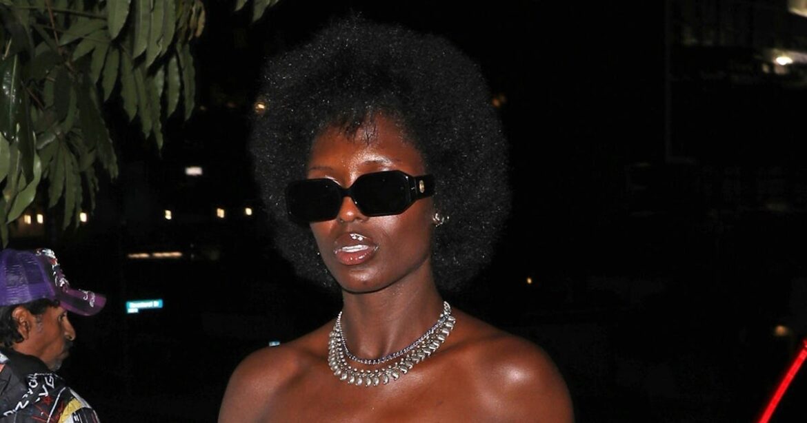 Jodie Turner-Smith Flashes Her Abs in a Bra Top & Plaid Rainbow Skirt