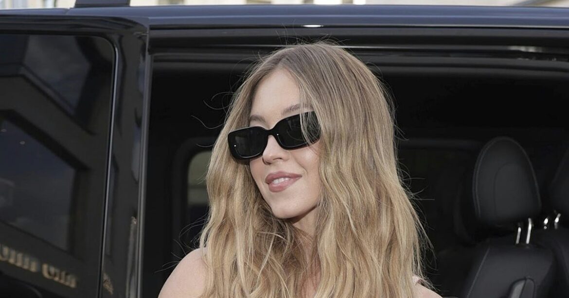 Sydney Sweeney Styles Exposed Bra With Sheer Socks & Heels in London