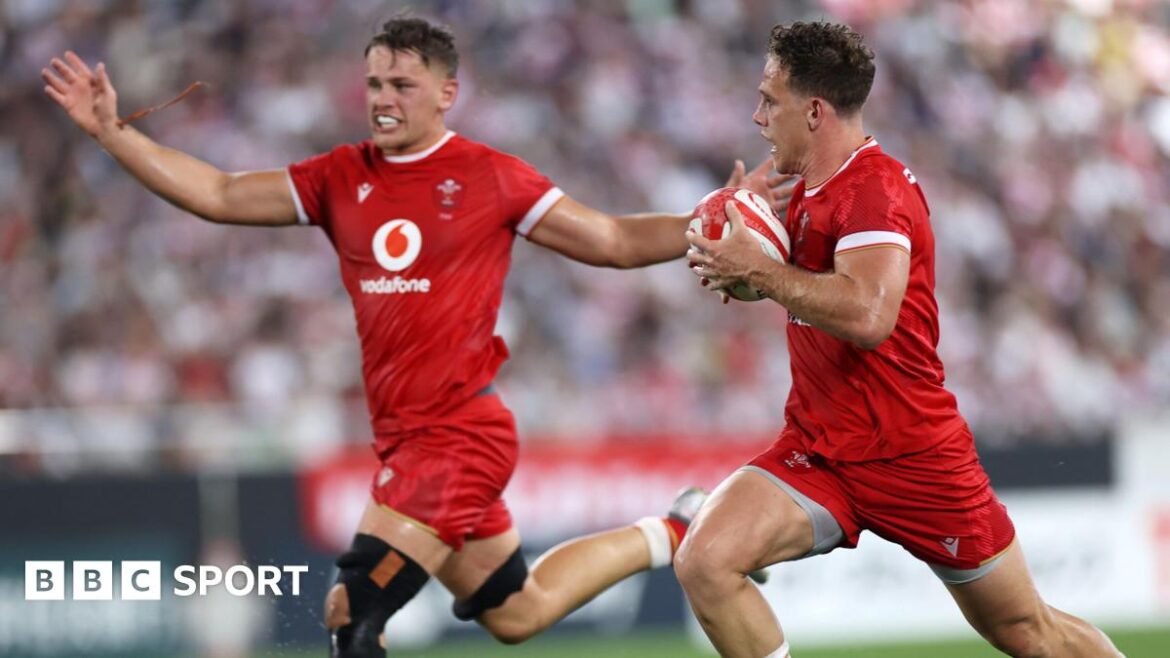 Alex Mann celebrates a try scored by Wales scrum-half Kieran Hardy